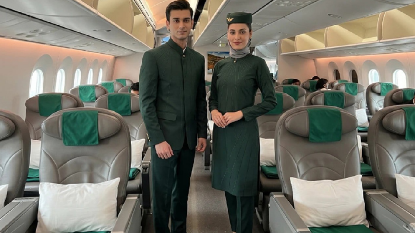Pakistan International Airlines cabin crew wearing new uniforms designed by Hassan Sheheryar Yasin (HSY).